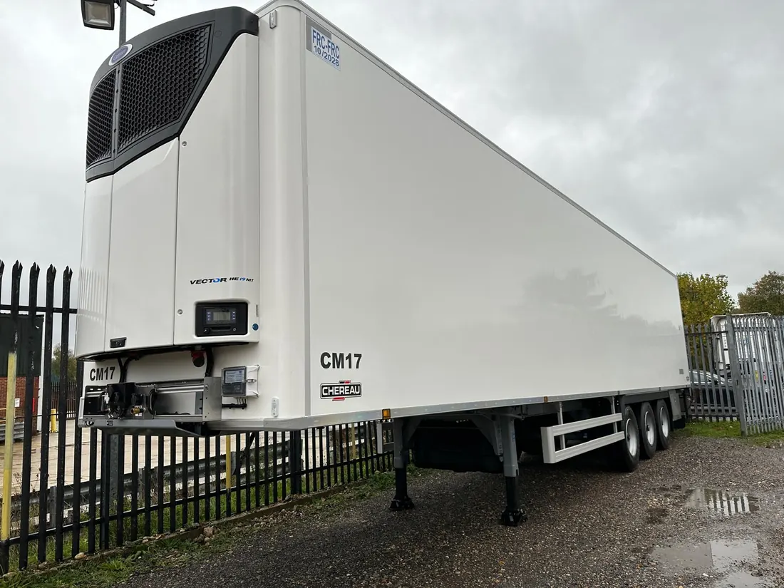 A Chereau refrigerated trailer, fleet number CM17, with its Carrier Vector HE multi-temp fridge unit mounted on the nose.